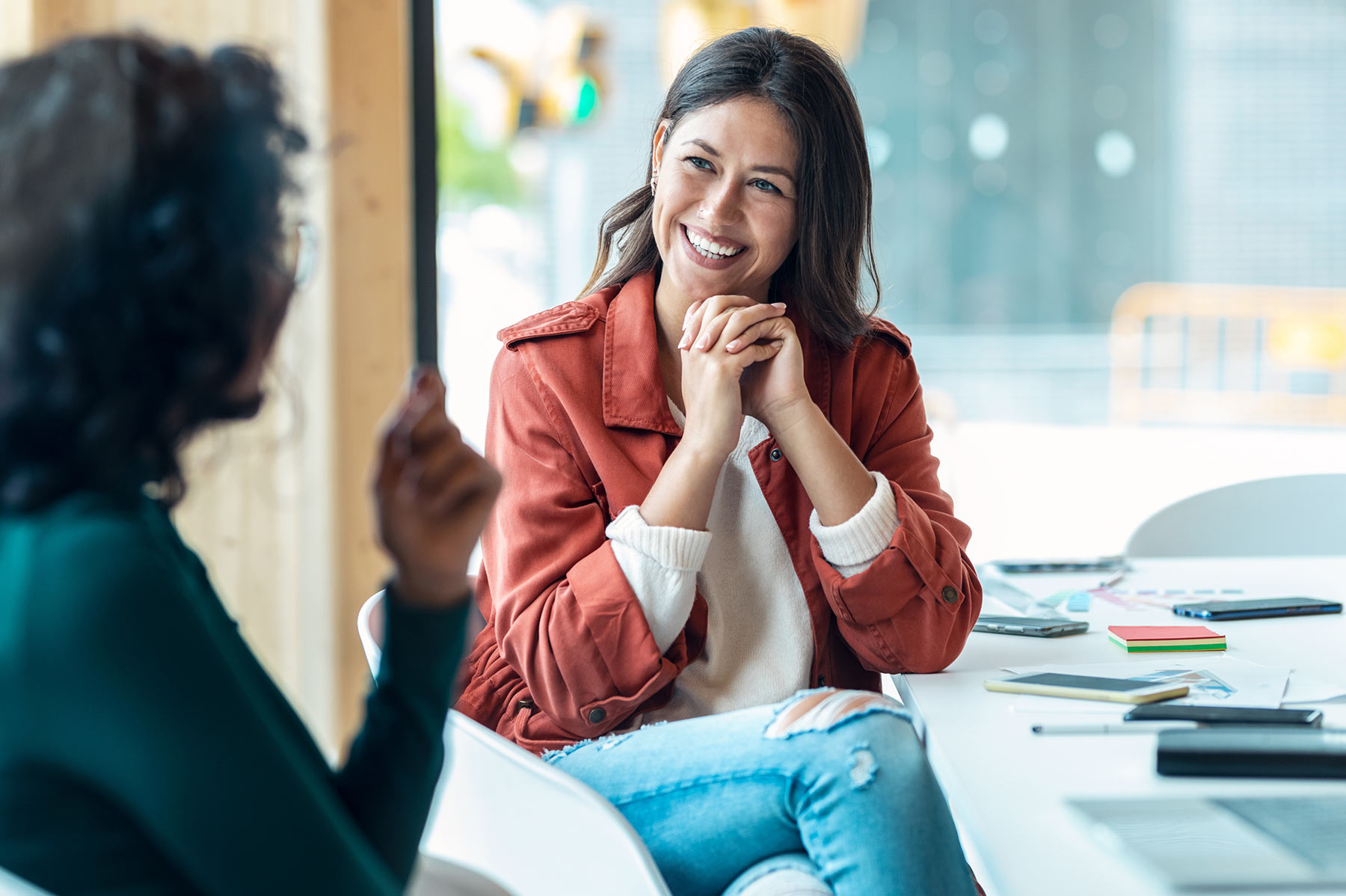 Measuring-and-evaluating-our-ESG-and-sustainability-action-driving-progress-1 Smart business people working together with laptop while talking in the coworking place