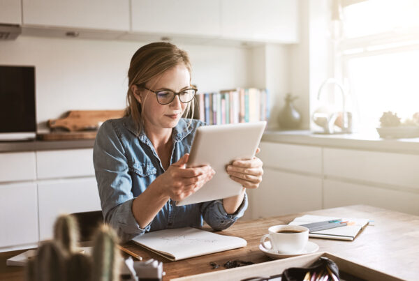 Lady on tablet working from home