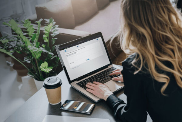 Lady on laptop carrying out a survey
