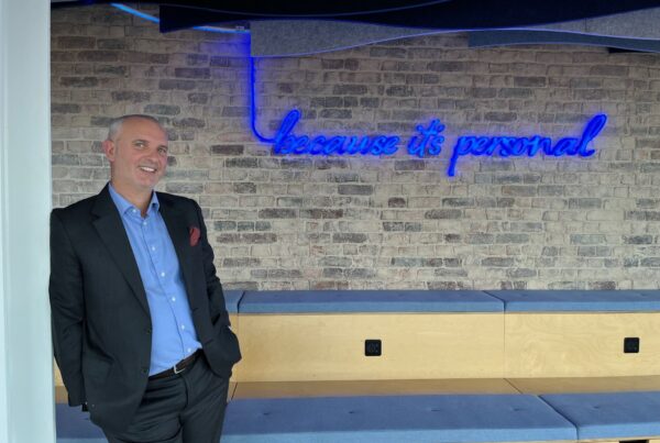 Nick Plummer with because it's personal neon sign