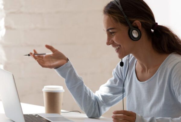 Smiling lady on a video conference call