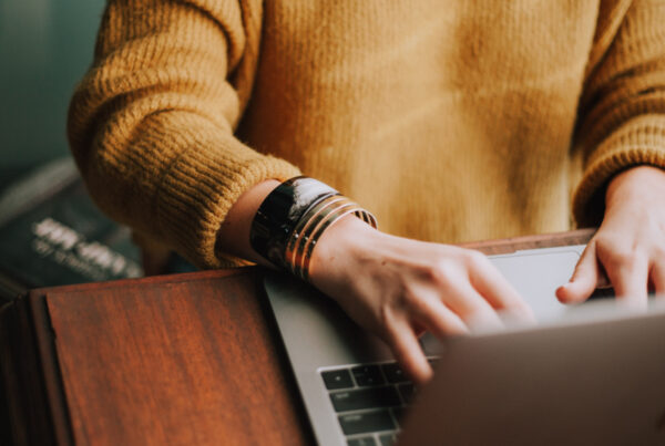 Person typing on a laptop