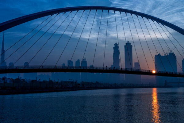 Singapore skyline sunset with bridge in foreground