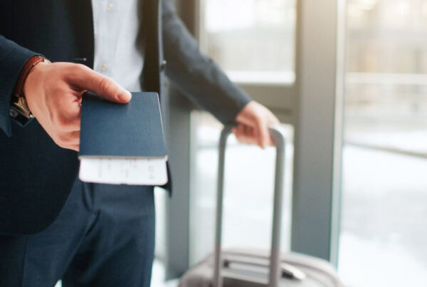 Man with passport in hand