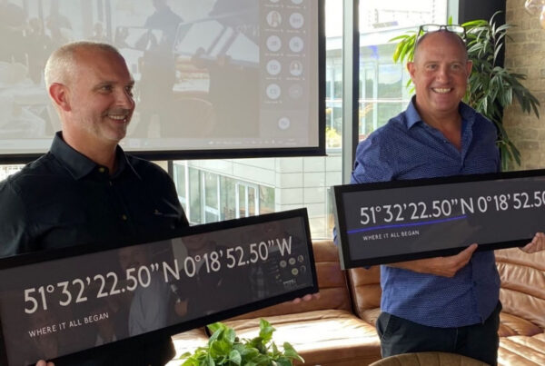 Nick Plummer and Richard Rutledge with picture frames - where it all began