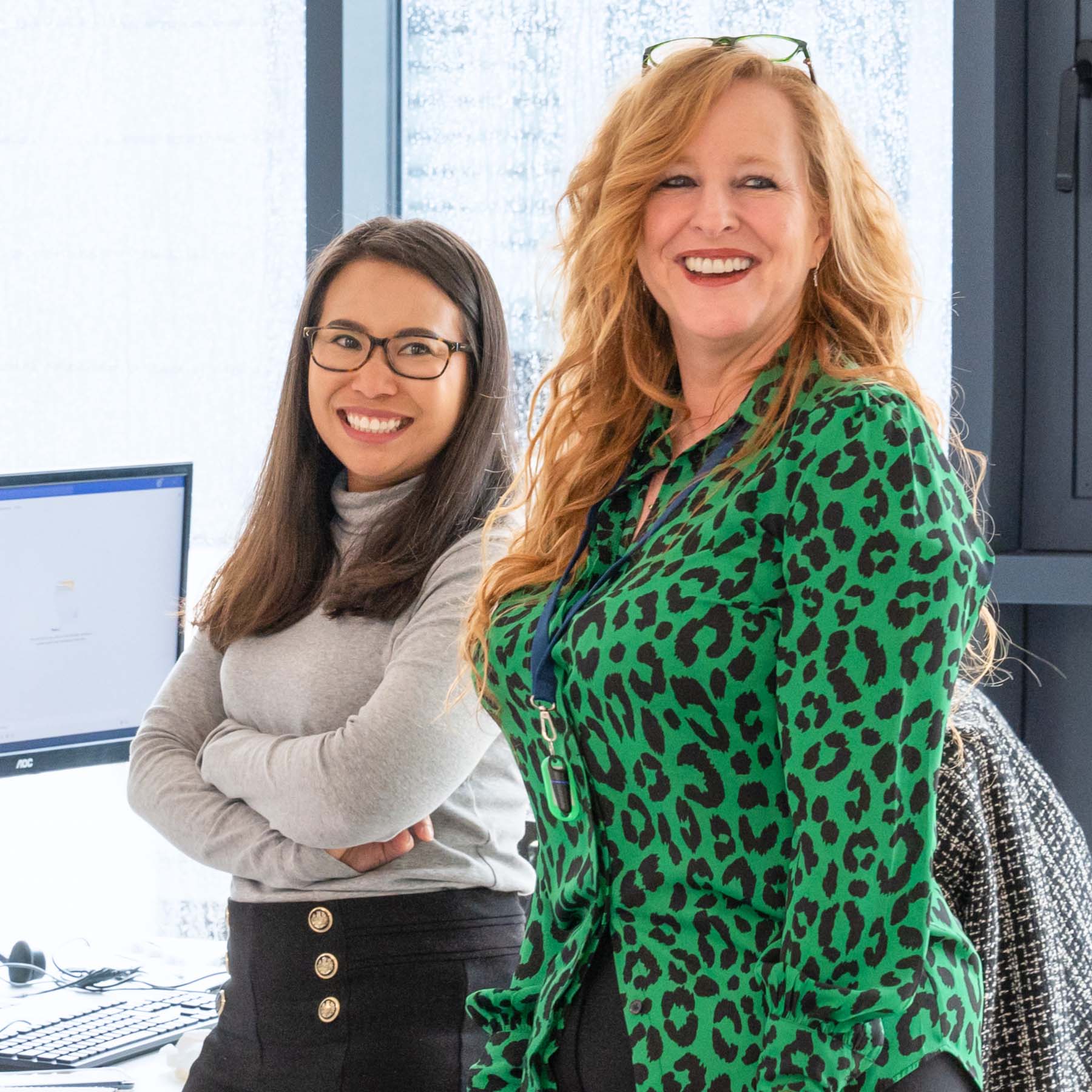 Smiling happy ladies in K2 office