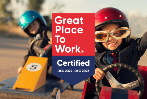 K2 Great Place To Work logo above racing boys in go karts