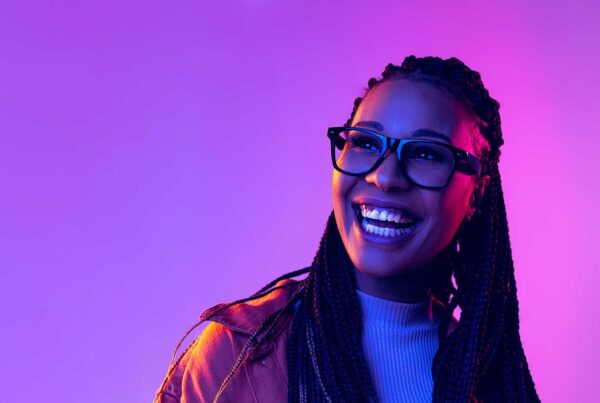 Laughing lady with pink purple lights