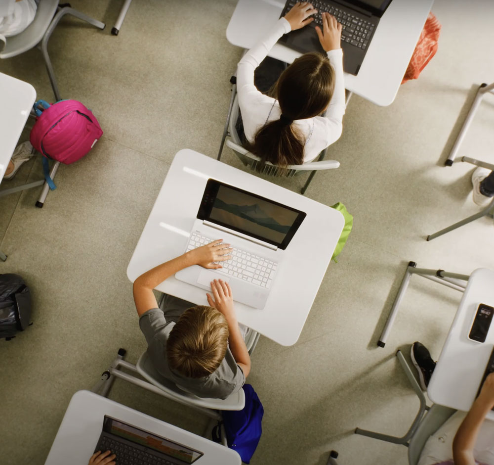 School kids using tech